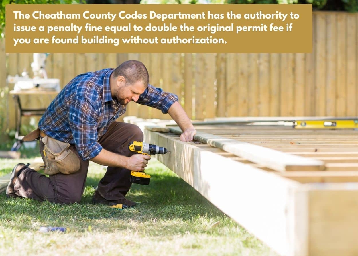 Contractor building a deck frame outdoors using power tools and treated lumber. Caption: The Cheatham County Codes Department has the authority to issue a penalty fine equal to double the original permit fee if you are found building without authorization.