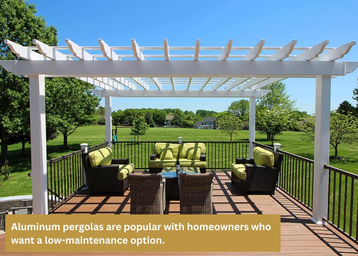 White aluminum pergola installed on a deck patio with outdoor seating and open landscape views.