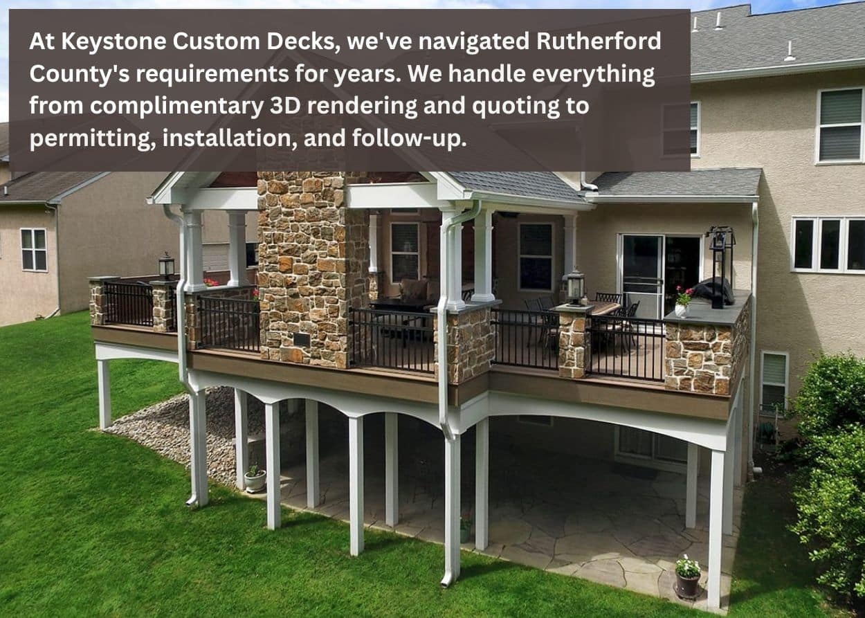 Covered deck with stone columns attached to custom home.