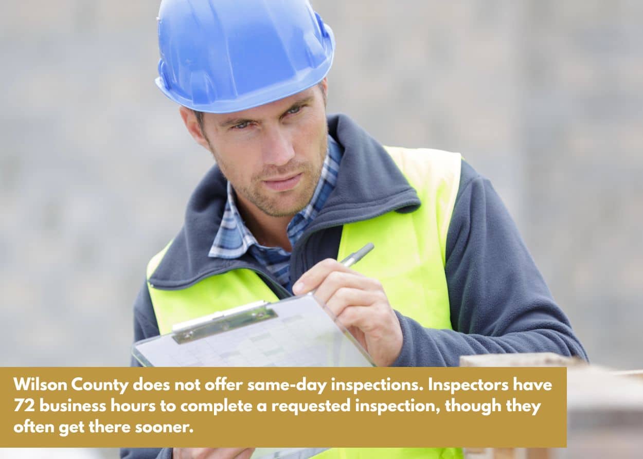 Construction worker inspecting materials with clipboard, representing planning and permit compliance for deck building